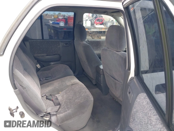 2001 Isuzu Rodeo S with VIN 4S2CK58W614329085, listed as a IAAI auction lot 42303013 with 171,933 mi miles and . Bid and sale history available at DreamBid. Image 8.