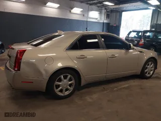2009 Cadillac CTS AWD w/1SA with VIN 1G6DG577590157729, listed as a IAAI auction lot 41878455 with 169,139 mi miles. Bid and sale history available at carsss.com. Image 4.