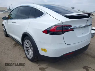 2020 Tesla Model X Long Range with VIN 5YJXCDE26LF238982, listed as a IAAI auction lot 42100220 with 44,804 mi miles. Bid and sale history available at carsss.com. Image 3.