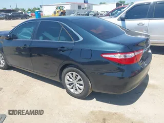 2016 Toyota Camry XLE with VIN 4T4BF1FK3GR535768, listed as a IAAI auction lot 41988698 with 157,452 mi miles. Bid and sale history available at carsss.com. Image 3.
