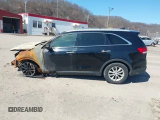 2016 Kia Sorento LX with VIN 5XYPGDA35GG055431, listed as a IAAI auction lot 41821606 with 141,011 mi miles. Bid and sale history available at carsss.com. Image 14.