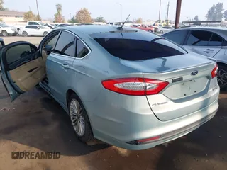 2014 Ford Fusion SE Hybrid with VIN 3FA6P0LU8ER283409, listed as a IAAI auction lot 40984629 with 206,605 mi miles. Bid and sale history available at carsss.com. Image 3.