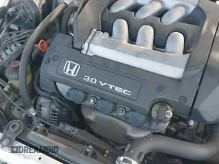 2002 Honda Accord EX with VIN 1HGCG22552A034799, listed as a IAAI auction lot 43001758 with 192,922 mi miles and . Bid and sale history available at DreamBid. Image 13.