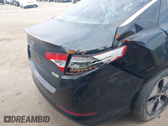 2012 Kia Optima Hybrid with VIN KNAGM4AD2C5014823, listed as a IAAI auction lot 42063169 with 125,235 mi miles. Bid and sale history available at carsss.com. Image 6.