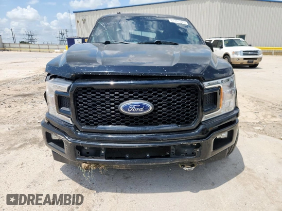 2018 Ford F-150 XL with VIN 1FTEW1E57JFC39493, listed as a Copart auction lot 61781395 with 129,871 mi miles and Salvage title. Bid and sale history available at DreamBid. Image 5.