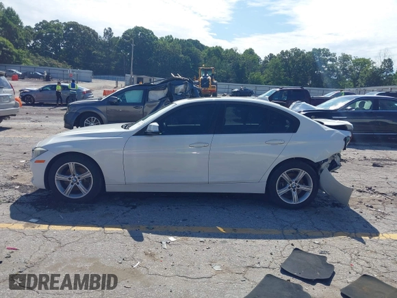2014 BMW 3 Series 328i with VIN WBA3A5C58EP602669, listed as a IAAI auction lot 42514389 with 187,330 mi miles and . Bid and sale history available at DreamBid. Image 15.