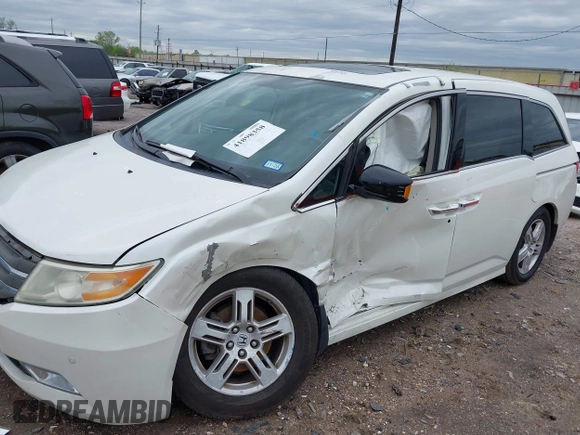 2013 Honda Odyssey Touring with VIN 5FNRL5H96DB074819, listed as a IAAI auction lot 41898358 with 123,428 mi miles and . Bid and sale history available at carsss.com. Image 6.