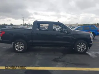 2023 Ford F-150 Lightning Pro with VIN 1FT6W1EV3PWG08587, listed as a IAAI auction lot 42418036 with Not provided miles and . Bid and sale history available at DreamBid. Image 12.