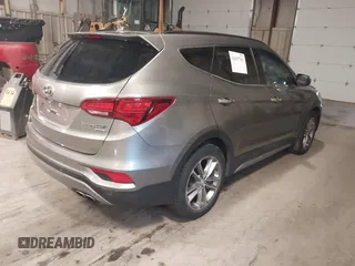 2017 Hyundai Santa Fe 2.0T with VIN 5XYZUDLA4HG424259, listed as a IAAI auction lot 42657783 with 213,040 mi miles and . Bid and sale history available at DreamBid. Image 4.