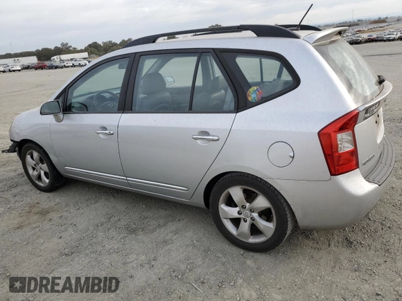 2009 Kia Rondo LX Base with VIN KNAFG528097222268, listed as a Copart auction lot 77797124 with 184,569 mi miles and Salvage Title. Bid and sale history available at carsss.com. Image 2.