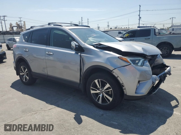 2018 Toyota RAV4 XLE with VIN JTMWFREV1JD119879, listed as a Copart auction lot 52236135 with 79,897 mi miles and Salvage Title. Bid and sale history available at carsss.com. Image 4.