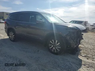 2019 Honda Pilot EX-L with VIN 5FNYF5H50KB034846, listed as a Copart auction lot 63022845 with 56,241 mi miles and Salvage title. Bid and sale history available at DreamBid. Image 4.