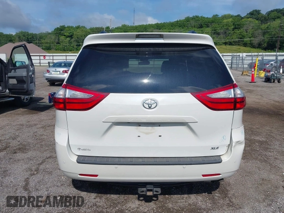 2016 Toyota Sienna XLE with VIN 5TDYK3DC4GS748888, listed as a IAAI auction lot 42605968 with 164,811 mi miles and . Bid and sale history available at DreamBid. Image 16.