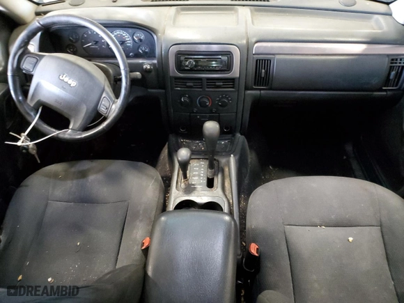 2002 Jeep Grand Cherokee Laredo with VIN 1J4GW48N52C240077, listed as a Copart auction lot 55919394 with 223,991 mi miles and Clean Title. Bid and sale history available at carsss.com. Image 8.