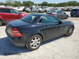 1999 Mercedes-Benz SLK-Class with VIN WDBKK47F5XF129037, listed as a Copart auction lot 68842504 with 74,397 mi miles and Salvage Title. Bid and sale history available at carsss.com. Image 3.