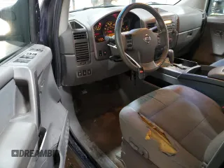 2007 Nissan Titan XE z VIN 1N6BA07A87N220937, wystawiony jako Copart lot #60336605 z przebiegiem 219 286 mil mil oraz Czysty tytuł • Clean title. Historia ofert i sprzedaży dostępna na DreamBid. Obrazek 8.