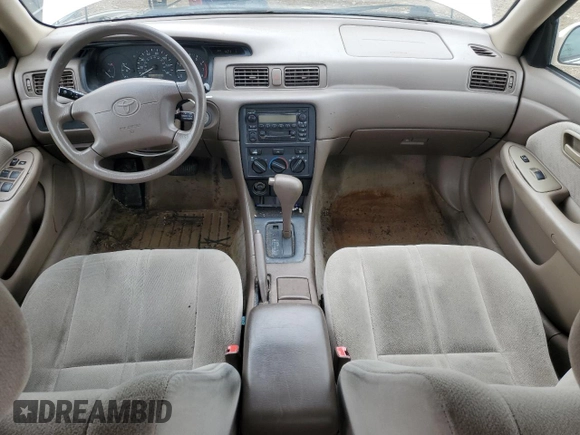 2000 Toyota Camry CE z VIN 4T1BG22K6YU991932, wystawiony jako Copart lot #55588155 z przebiegiem 188 363 mil mil oraz Szkoda całkowita • Salvage title. Historia ofert i sprzedaży dostępna na DreamBid. Obrazek 8.