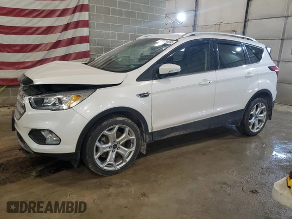2019 Ford Escape Titanium with VIN 1FMCU9J97KUC37529, listed as a Copart auction lot 42243404 with 37,677 mi miles and Salvage Title. Bid and sale history available at carsss.com. Image 1.