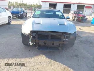 2020 Ford Mustang EcoBoost with VIN 1FATP8UH6L5138744, listed as a IAAI auction lot 41264200 with 55,408 mi miles and . Bid and sale history available at carsss.com. Image 6.