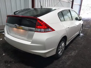 2012 Honda Insight EX with VIN JHMZE2H71CS003132, listed as a IAAI auction lot 42582548 with 112,593 mi miles and . Bid and sale history available at DreamBid. Image 4.