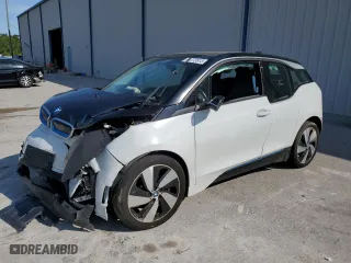 2018 BMW i3 with VIN WBY7Z2C52JVE64727, listed as a Copart auction lot 61073513 with 71,690 mi miles. Bid and sale history available at carsss.com. Image 1.