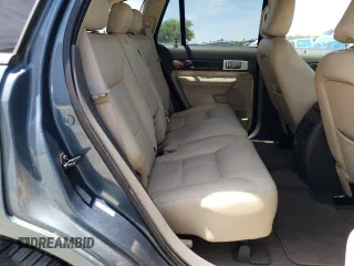 2010 Lincoln MKX z VIN 2LMDJ6JC9ABJ02617, wystawiony jako Copart lot #57953465 z przebiegiem 141 791 mil mil oraz Szkoda całkowita • Salvage title. Historia ofert i sprzedaży dostępna na DreamBid. Obrazek 11.