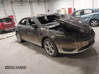 2014 Ford Taurus SEL with VIN 1FAHP2E81EG136022, listed as a IAAI auction lot 41937132 with 76,285 mi miles and . Bid and sale history available at DreamBid. Image 1.