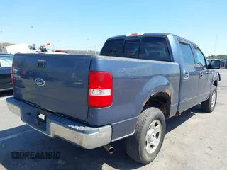 2004 Ford F-150 XLT with VIN 1FTRW14W24KA27415, listed as a IAAI auction lot 42081888 with 149,897 mi miles. Bid and sale history available at carsss.com. Image 4.