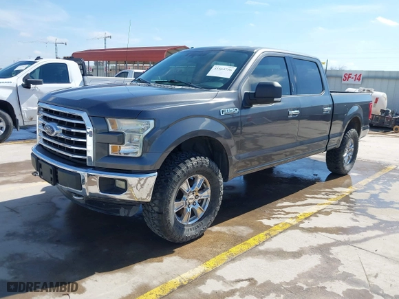 2015 Ford F-150 XLT w/HD Payload Pkg with VIN 1FTFW1EF7FKD04869, listed as a IAAI auction lot 41664736 with 165,784 mi miles. Bid and sale history available at carsss.com. Image 17.