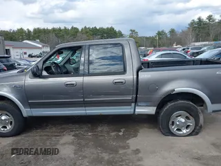 2003 Ford F-150 XLT with VIN 1FTRW08L63KA37275, listed as a IAAI auction lot 41875128 with 133,257 mi miles. Bid and sale history available at carsss.com. Image 14.