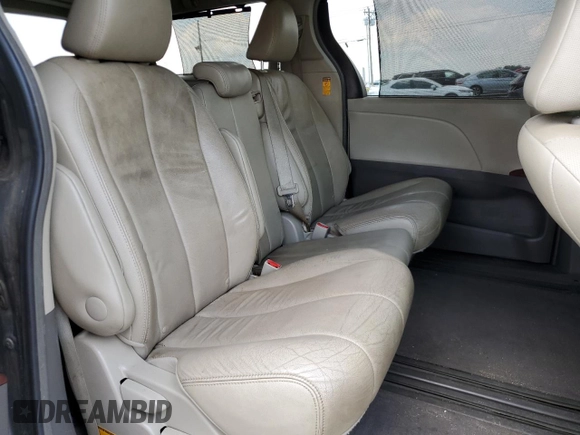 2014 Toyota Sienna XLE with VIN 5TDYK3DC6ES456558, listed as a Copart auction lot 63106085 with 231,260 mi miles and Salvage title. Bid and sale history available at DreamBid. Image 11.