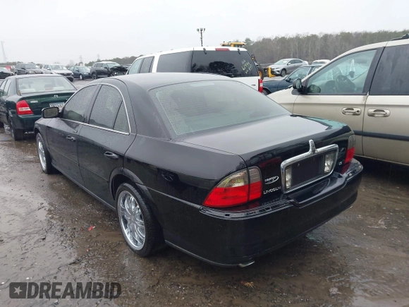 2005 Lincoln LS w/Luxury Pkg with VIN 1LNHM86S85Y618900, listed as a IAAI auction lot 41308598 with 203,974 mi miles. Bid and sale history available at carsss.com. Image 3.