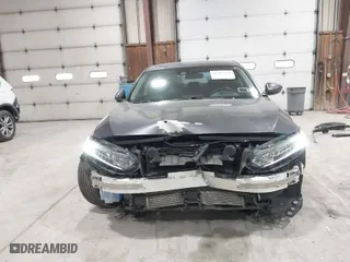 2018 Honda Accord Sedan LX 1.5T with VIN 1HGCV1F11JA155755, listed as a IAAI auction lot 41763914 with 62,897 mi miles. Bid and sale history available at carsss.com. Image 6.