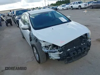 2017 Ford Focus SE with VIN 1FADP3F28HL285649, listed as a IAAI auction lot 39718289 with 118,366 mi miles and . Bid and sale history available at DreamBid. Image 1.