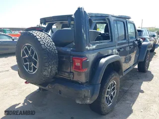 2024 Jeep Wrangler Rubicon with VIN 1C4PJXFG5RW259926, listed as a IAAI auction lot 42009249 with 37,988 mi miles. Bid and sale history available at carsss.com. Image 4.