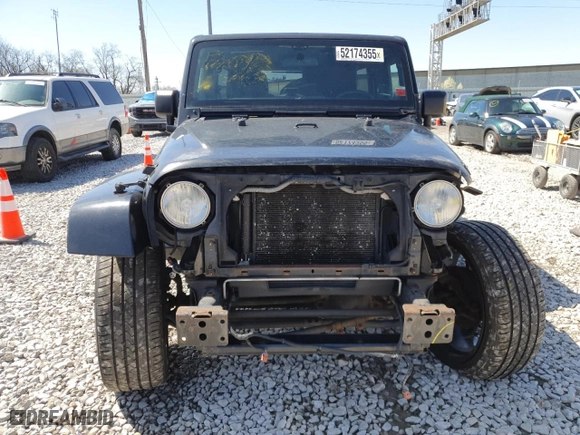 2011 Jeep Wrangler Unlimited Sahara with VIN 1J4HA5H13BL561993, listed as a Copart auction lot 52174355 with 66,092 mi miles and Salvage Title. Bid and sale history available at carsss.com. Image 5.