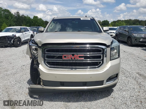 2015 GMC Yukon XL SLE z VIN 1GKS1GKC6FR203201, wystawiony jako Copart lot #53888885 z przebiegiem 202 601 mil mil oraz Szkoda całkowita • Salvage title. Historia ofert i sprzedaży dostępna na DreamBid. Obrazek 5.