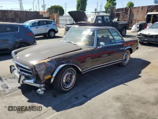1970 Mercedes-Benz SL with VIN 11304412015305, listed as a Copart auction lot 65378684 with 83,202 mi miles and Salvage title. Bid and sale history available at DreamBid. Image 1.