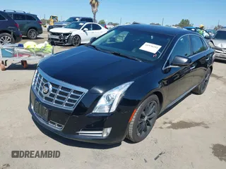 2013 Cadillac XTS Luxury z VIN 2G61P5S30D9220113, wystawiony jako IAAI lot #41970214 z przebiegiem 52 476 mil mil oraz . Historia ofert i sprzedaży dostępna na DreamBid. Obrazek 17.