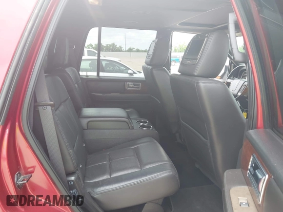 2013 Lincoln Navigator z VIN 5LMJJ2H56DEL07915, wystawiony jako IAAI lot #42138639 z przebiegiem 143 437 mil mil oraz . Historia ofert i sprzedaży dostępna na DreamBid. Obrazek 8.