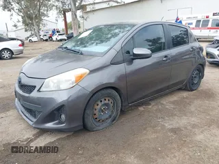 2013 Toyota Yaris L with VIN JTDKTUD34DD547878, listed as a IAAI auction lot 42108444 with 241,269 mi miles. Bid and sale history available at carsss.com. Image 2.