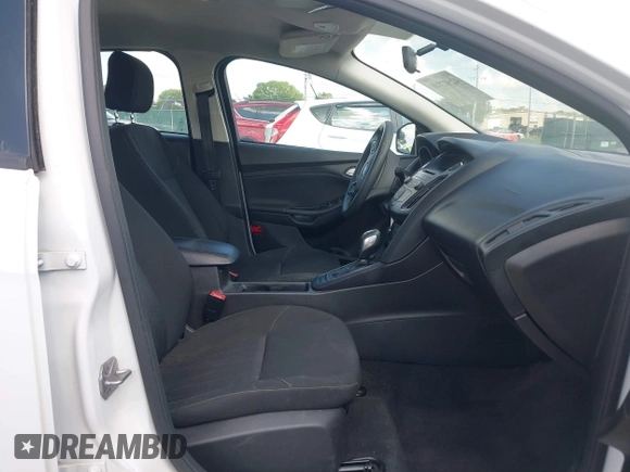 2015 Ford Focus SE with VIN 1FADP3F2XFL335884, listed as a IAAI auction lot 42582740 with 102,036 mi miles and . Bid and sale history available at DreamBid. Image 5.