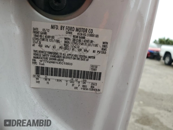 2012 Ford F-250 XL with VIN 1FT7X2A61CEC15533, listed as a Copart auction lot 57883444 with 195,030 mi miles and Salvage title. Bid and sale history available at DreamBid. Image 12.