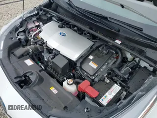2021 Toyota Prius L Eco with VIN JTDKAMFU6M3137679, listed as a IAAI auction lot 42488129 with 52,414 mi miles and . Bid and sale history available at DreamBid. Image 10.
