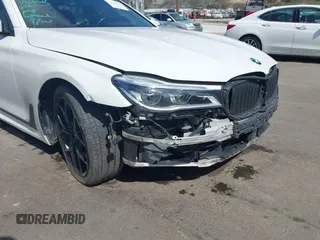 2017 BMW 7 Series 750i with VIN WBA7F0C32HGM22273, listed as a IAAI auction lot 41857151 with 90,518 mi miles and . Bid and sale history available at carsss.com. Image 17.