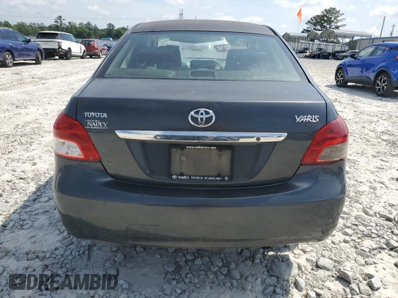 2009 Toyota Yaris z VIN JTDBT903291313024, wystawiony jako Copart lot #54714205 z przebiegiem 338 203 mil mil oraz Szkody całkowita. Historia ofert i sprzedaży dostępna na DreamBid. Obrazek 6.