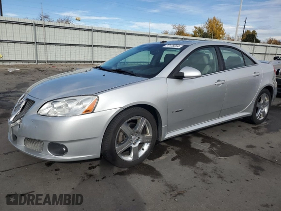 2009 Pontiac G6 with VIN 1G2ZL577094232011, listed as a Copart auction lot 77175054 with 133,353 mi miles and Salvage title. Bid and sale history available at DreamBid. Image 1.