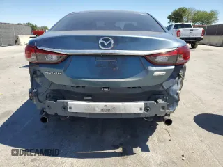 2014 Mazda 6 i Touring with VIN JM1GJ1T66E1116919, listed as a Copart auction lot 49992645 with 141,504 mi miles and Salvage title. Bid and sale history available at DreamBid. Image 9.