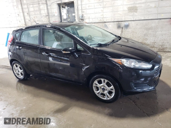 2014 Ford Fiesta SE z VIN 3FADP4EJ7EM145326, wystawiony jako Copart lot #62030855 z przebiegiem 83 625 mil mil oraz Czysty tytuł • Clean title. Historia ofert i sprzedaży dostępna na DreamBid. Obrazek 4.