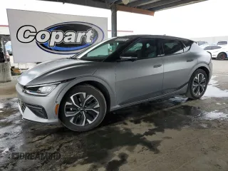 2023 Kia EV6 GT-Line z VIN KNDC44LAXP5117577, wystawiony jako Copart lot #53741415 z przebiegiem 9 887 mil mil oraz Szkoda całkowita • Salvage title. Historia ofert i sprzedaży dostępna na DreamBid. Obrazek 1.